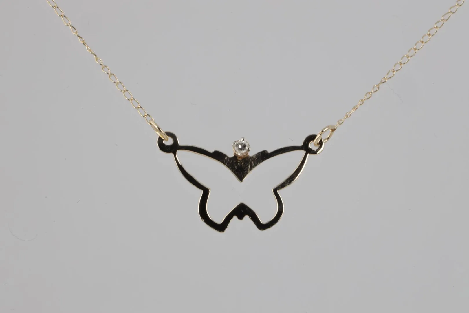 15.5'' 14k Yellow Gold 0.01tcw Diamond Butterfly Necklace (0.80g.)